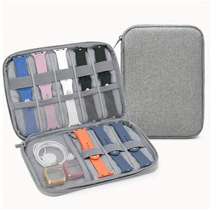 Grauer Travel Organizer geöffnet und geschlossen mit Armbändern und Zubehör